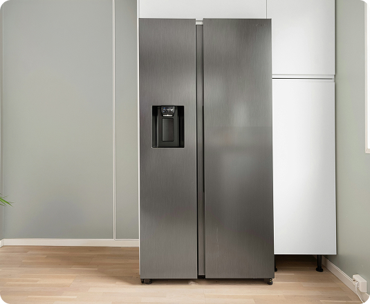 Old refrigerator waiting for junk removal pickup