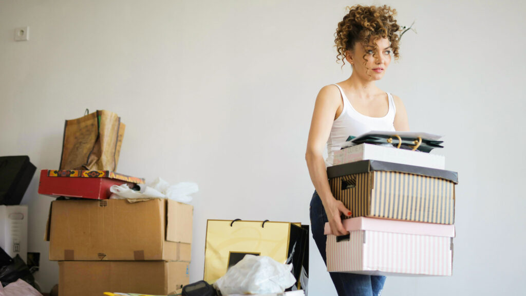 Woman organizing decluttering her home.
