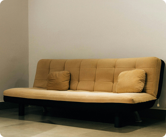 Old couch ready to be pickup up for junk removal with EasyGig.