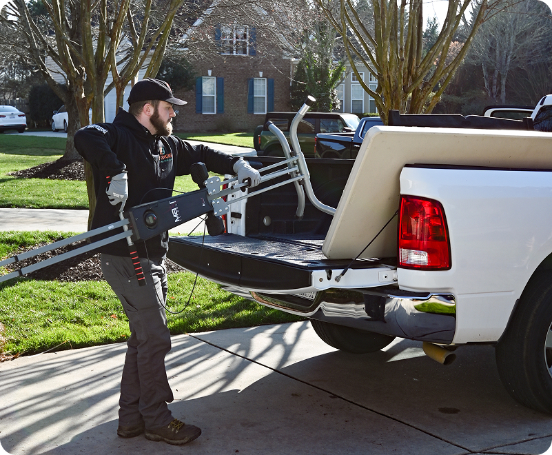 EasyGig Hauler loading up his truck with bulky junk removal.