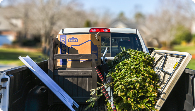 A loaded up EasyGig Junk Removal pickup truck, ready to dispose of the junk responsibly.