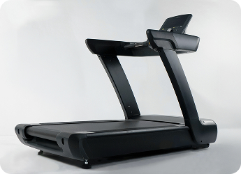 A treadmill ready to be removed by EasyGig Junk Removal.
