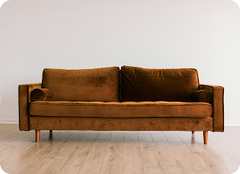 Old couch ready to be pickup up for junk removal with EasyGig.
