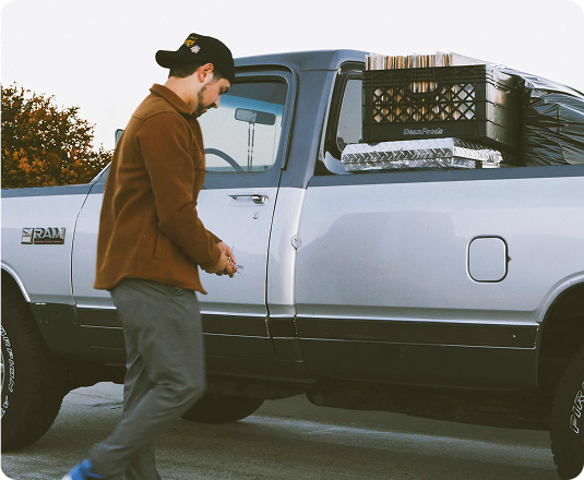 EasyGig Hauler loading up a junk removal haul with unwanted items.