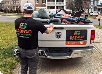 EasyGig Hauler loading a donated items for the Salvation Army.
