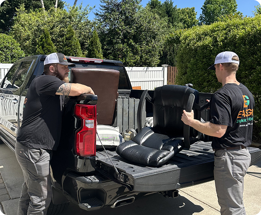 EasyGig Haulers loading up a junk removal haul
