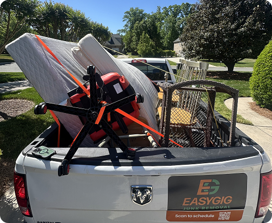 EasyGig Pickup Truck loaded with mattresses and other household junk removal.