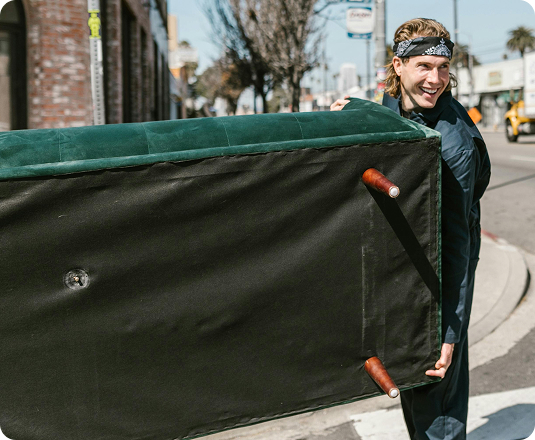 EasyGig Hauler pickingup a couch curbside for furniture removal