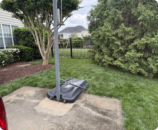 A suburban yard cleared of junk removal with help from EasyGig Junk Removal