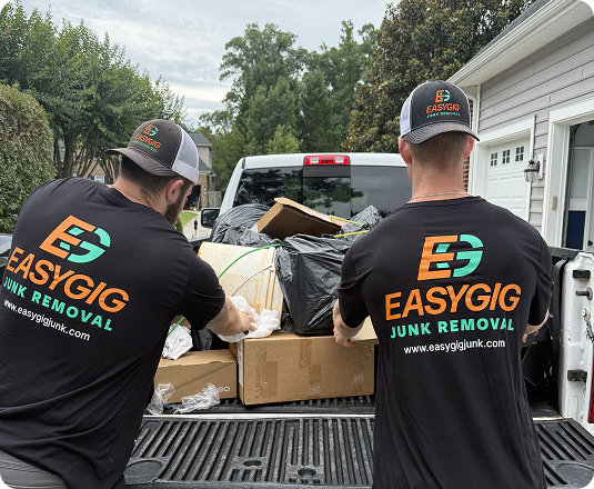 EasyGig Haulers Loading a Pickup Truck with junk