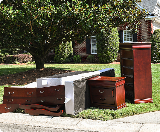 Junk ready to be picked up curbside by EasyGig Junk Removal