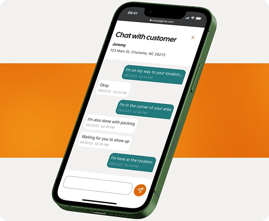 Mobile phone showing EasyGig Junk Removal's Hauler app with a chat between hauler and customer.