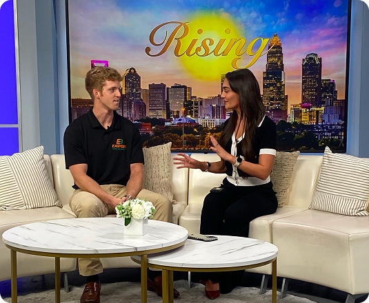 WCCB host Taylor Miller with EasyGig's CEO Brendan Little on set of WCCB's Rising TV segment