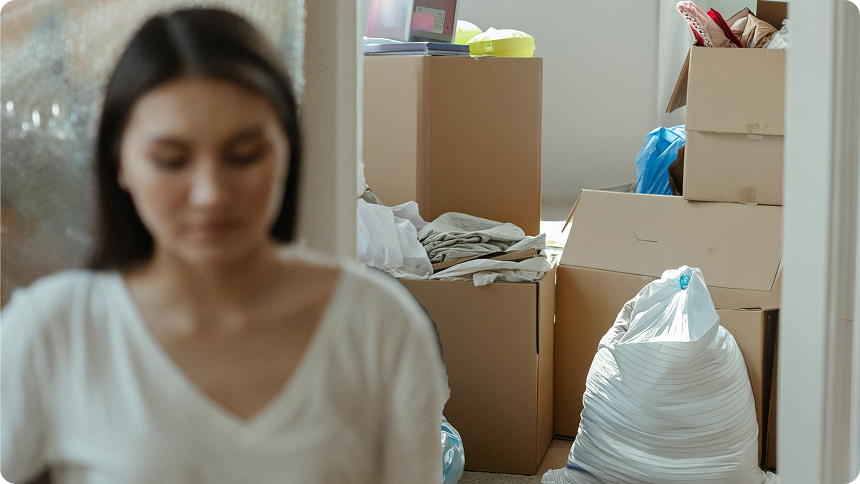 Woman decluttering her house before using EasyGig Junk Removal